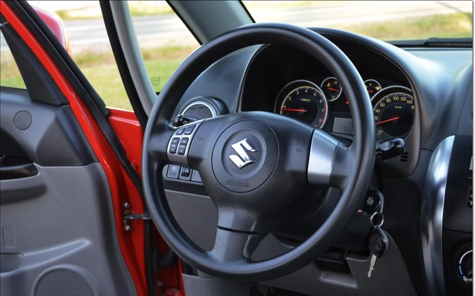 Suzuki SX4 cena 31900 przebieg: 93865, rok produkcji 2013 z Piastów małe 562